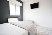 A bed or beds in a room at Casa con piscina en zona rural