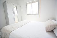 A bed or beds in a room at Casa con piscina en zona rural