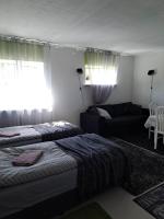 Postel nebo postele na pokoji v ubytování Kullerkupu Hostel