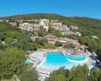 an aerial view of a resort with a swimming pool at Vue panoramique mer et collines in Grimaud