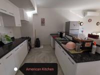 Kuchyň nebo kuchyňský kout v ubytování Marassi blanca vibes 3bedrooms family apartment