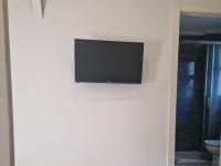 TV a/nebo společenská místnost v ubytování Habitaciones boutiques