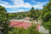 an aerial view of two tennis courts at Grande Villa à Sainte Maxime - Golfe de Saint Tropez in Sainte-Maxime