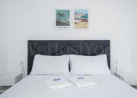 Postel nebo postele na pokoji v ubytování Welhomy - Magnifique Maison Vue Mer - Roses, Bramer 13