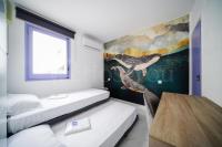 Postel nebo postele na pokoji v ubytování Welhomy - Magnifique Maison Vue Mer - Roses, Bramer 13