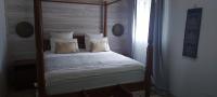 En eller flere senge i et v&aelig;relse p&aring; Villa Ananda
