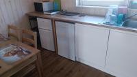 Kuchnia lub aneks kuchenny w obiekcie Lazurowe Apartamenty