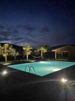 Bazén v ubytovaní Agriturismo Il Pozzo alebo v jeho blízkosti