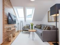 Televízia a/alebo spoločenská miestnosť v ubytovaní Ski-Nature Apartment Lungau