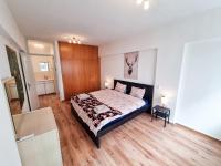 Postel nebo postele na pokoji v ubytování CityCenter Apartment