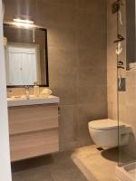 A bathroom at Luxury Central Apartment