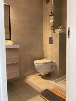 A bathroom at Luxury Central Apartment