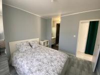 Posteľ alebo postele v izbe v ubytovaní Chambre chez Marjorie