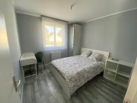 Posteľ alebo postele v izbe v ubytovaní Chambre chez Marjorie