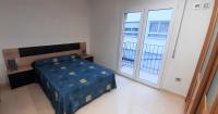 Posteľ alebo postele v izbe v ubytovaní Apartament Centre Platja