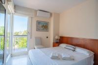 Postel nebo postele na pokoji v ubytování Casa Cala Balmins