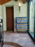 a porch with a bench next to a door at Cadre d&#39;exception in Orange