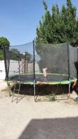 a person is standing on a trampoline at Cadre d&#39;exception in Orange