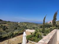 a view of the ocean from the balcony of a house at KATKA Karavas in Kythira