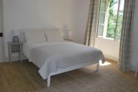Ein Bett oder Betten in einem Zimmer der Unterkunft La ferme de Roquedure