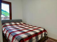 Posteľ alebo postele v izbe v ubytovaní D'Hérens apartment