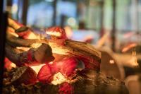 a close up of a piece of meat on fire at Hotel Rhönkitz in Bad Kissingen