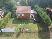 an aerial view of a small house with a garden at Charmant chalet en Auvergne proche du lac in Saint-Rémy-sur-Durolle