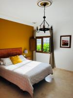 Posteľ alebo postele v izbe v ubytovaní HOTEL-FINCA Rural José Manuel 28pax