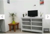 Telewizja i/lub zestaw kina domowego w obiekcie Corralejo city beach