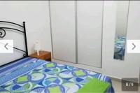 Łóżko lub łóżka w pokoju w obiekcie Corralejo city beach