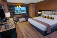 Ein Bett oder Betten in einem Zimmer der Unterkunft Golden Nugget Biloxi