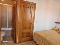 Postel nebo postele na pokoji v ubytování Triplex corral(centro grove)