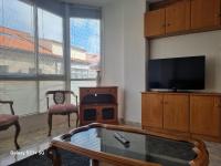 TV a/nebo společenská místnost v ubytování Triplex corral(centro grove)