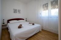 Posteľ alebo postele v izbe v ubytovaní Apartments with a parking space Sali, Dugi otok - 16324