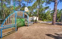 a playground with a gate and a frisbee at 2 Bedroom Beautiful Home In La Faute-sur-mer in La Faute-sur-Mer