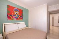 Posteľ alebo postele v izbe v ubytovaní Azzurra Apartments