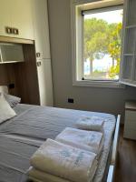 A bed or beds in a room at Villa Cataleya