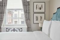 Great Scotland Yard Hotel, part of Hyattにあるベッド