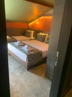 Postel nebo postele na pokoji v ubytování Dolphin Park Hotel