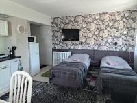 Postel nebo postele na pokoji v ubytování Kullerkupu Hostel