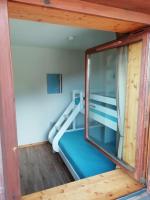 a room with a bunk bed and a mirror at CHAMROUSSE T2 Sud Ski Rando et Vtt aux pieds Les balcons du Recoin in Chamrousse