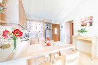 A kitchen or kitchenette at Mazis Deluxe Apartment