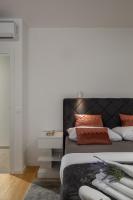 Posteľ alebo postele v izbe v ubytovaní Luxury apartment Marco Polo with a private swimming pool with salt sea water