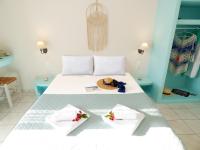 Posteľ alebo postele v izbe v ubytovaní Tasoula Guest House