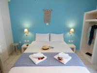 Posteľ alebo postele v izbe v ubytovaní Tasoula Guest House