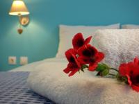 Posteľ alebo postele v izbe v ubytovaní Tasoula Guest House