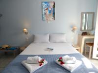 Posteľ alebo postele v izbe v ubytovaní Tasoula Guest House