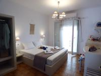 Posteľ alebo postele v izbe v ubytovaní Tasoula Guest House