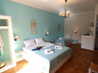 Posteľ alebo postele v izbe v ubytovaní Tasoula Guest House