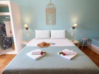 Posteľ alebo postele v izbe v ubytovaní Tasoula Guest House